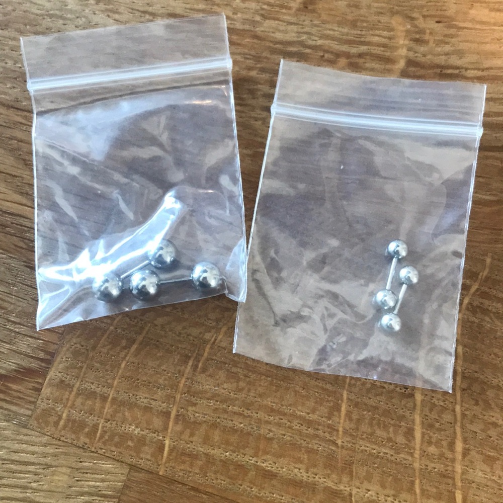 Two sets of silver stud earrings w/ twist on backs